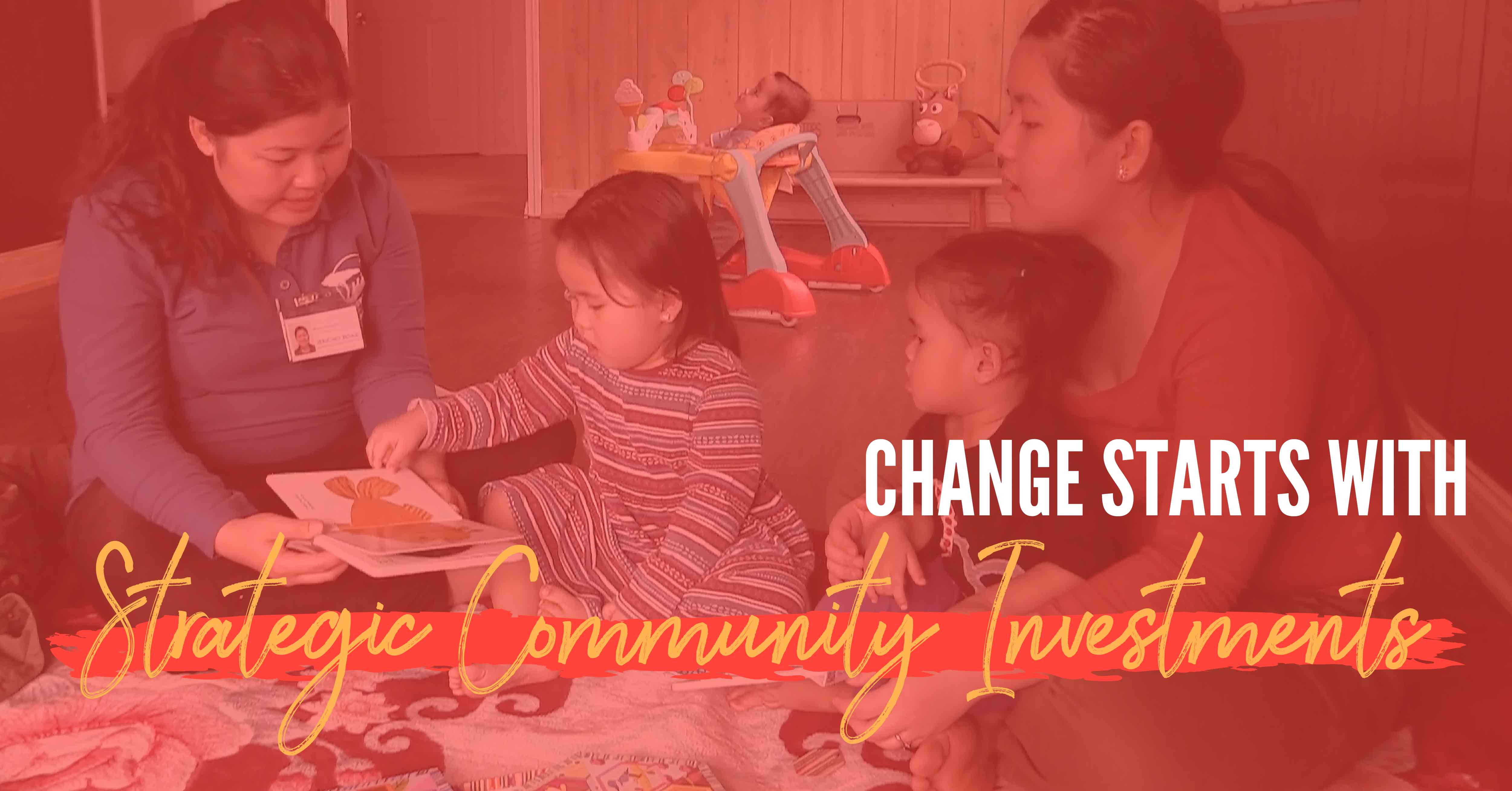 A woman sharing a book with a toddler with red overlay and the words "change starts with strategic community investments"